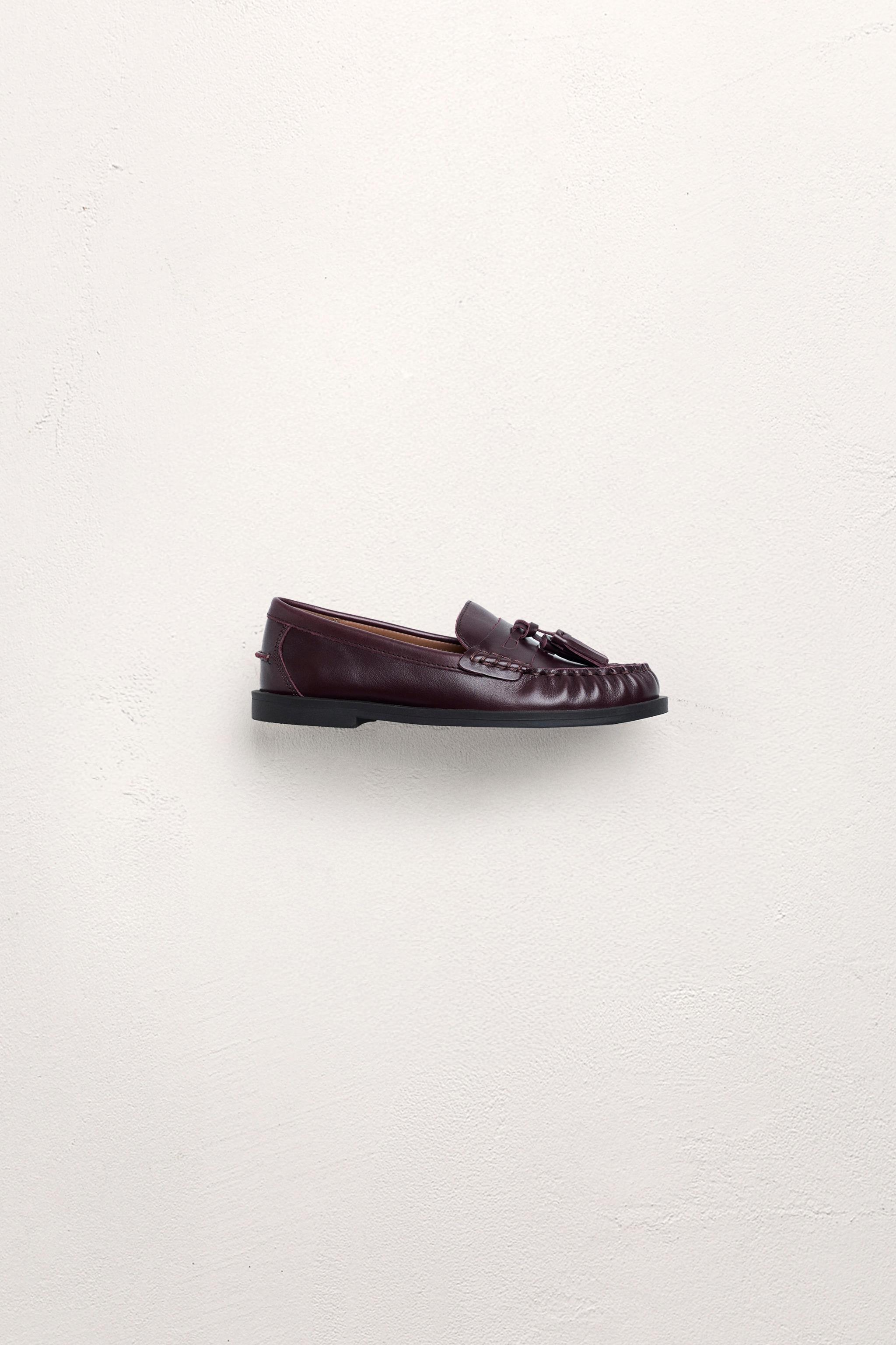 MOCASSINS À POMPONS EN CUIR LIMITED EDITION